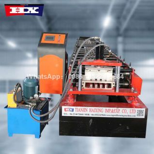 Trapezoidal roof and wall panel roll forming machine